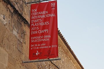 a sign outside a museum in pollenca