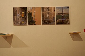 4 paintings on a wall in a museum