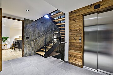 A staircase leading up to the second floor of a house