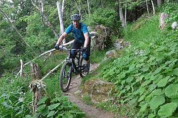 a mountain biker on a trail in chamonix centre