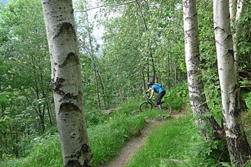 a mtb taking a left hand corner in chamonix