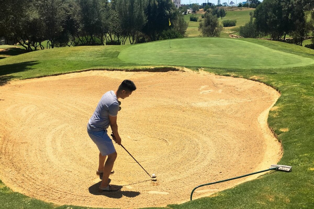 Playing the pitch & putt golf course near Palma