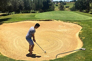 Playing the Pitch & Putt golf course near Palma
