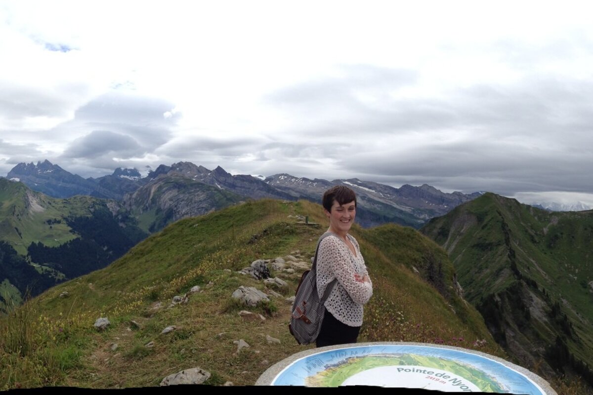 a woman at a mountain view point in Morzine