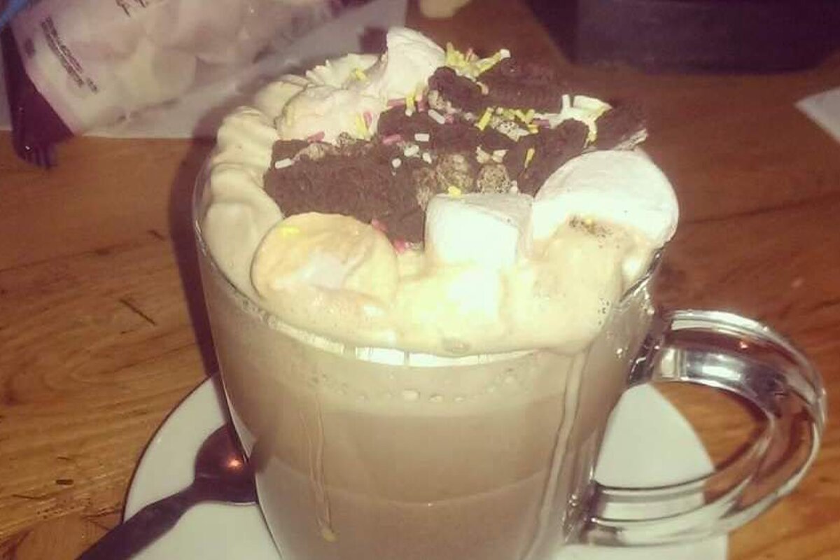 a huge hot chocolate at fall line bar val d'isere