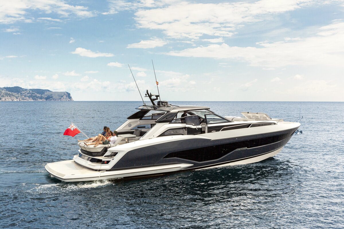 A boat with a british flag on the back of it