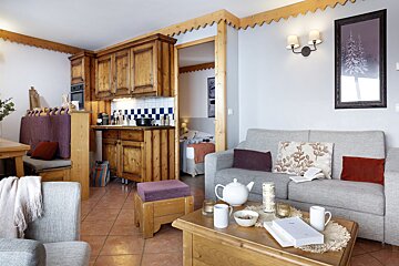 A living room with a couch and a coffee table