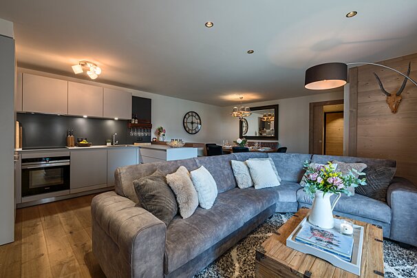 A living room with a couch and a coffee table