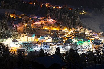 An image of les gets lit up at night