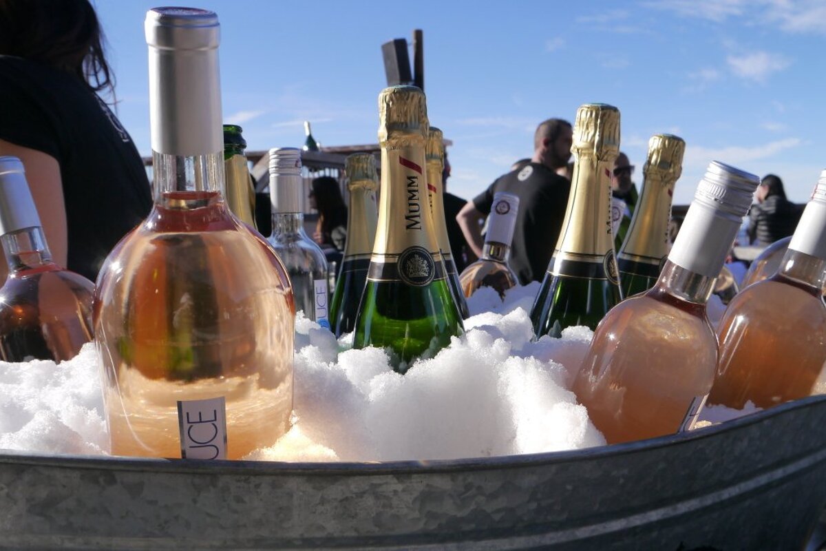 an ice bucket with drinks