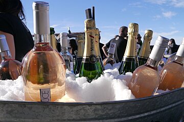 an ice bucket with drinks