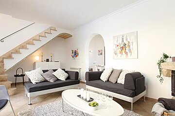 A living room with two couches and a coffee table