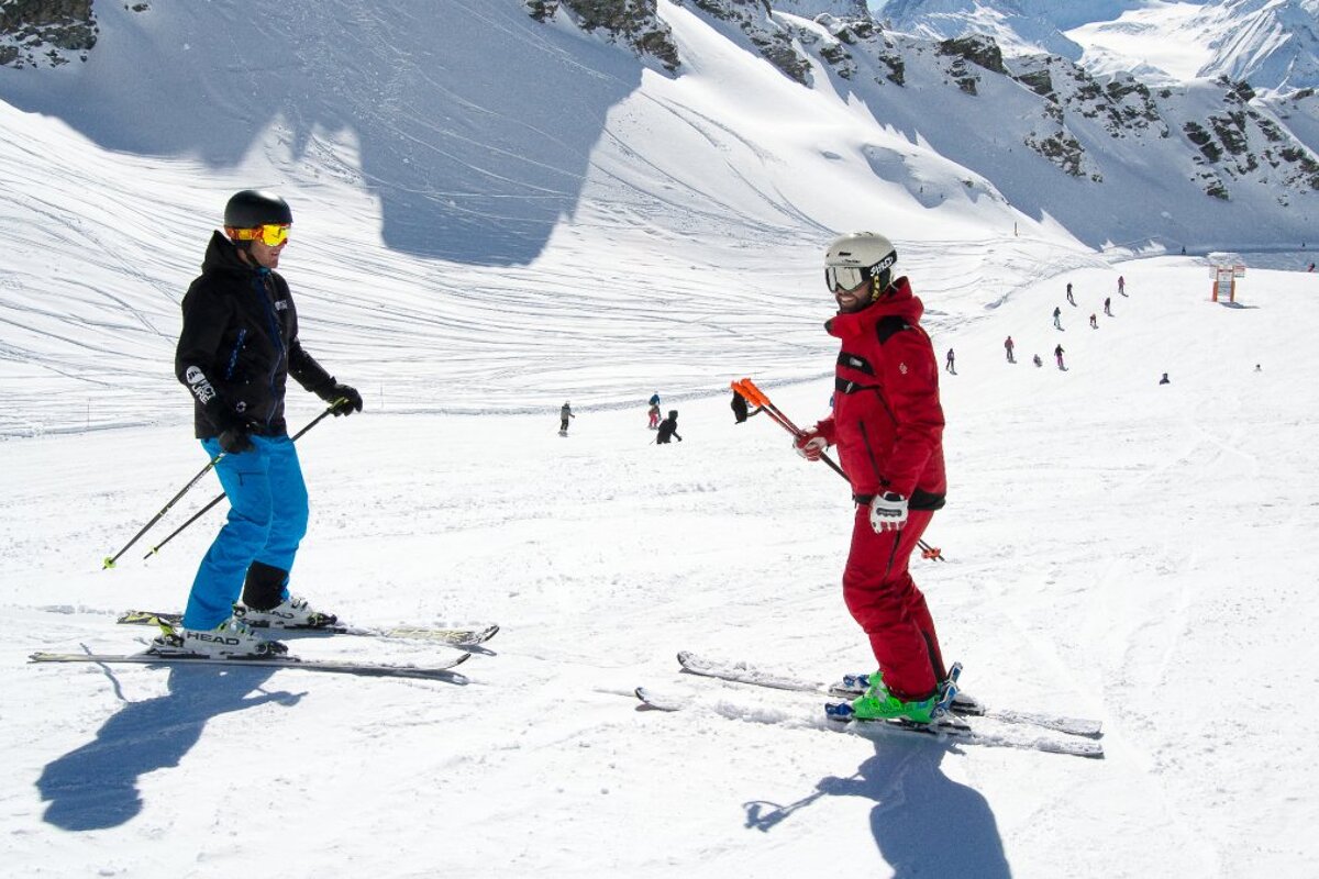 a ski instructor giving a private lesson