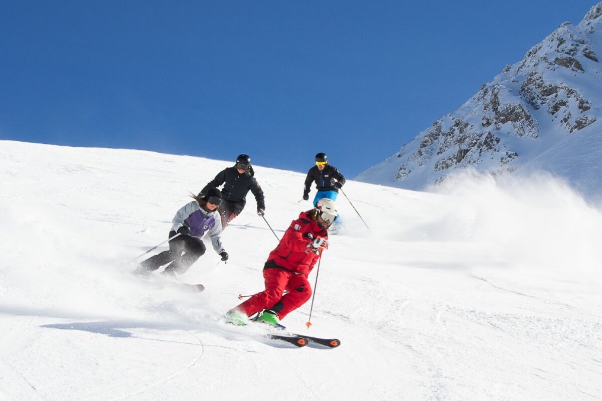 a ski instructor giving a private lesson