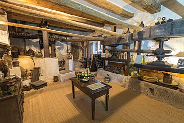 A room with a table and bottles on it