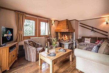 A living room with a television that says universal on it