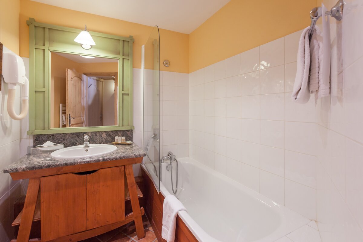 A bathroom with a sink and a bathtub