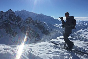 a skier in the high mountains