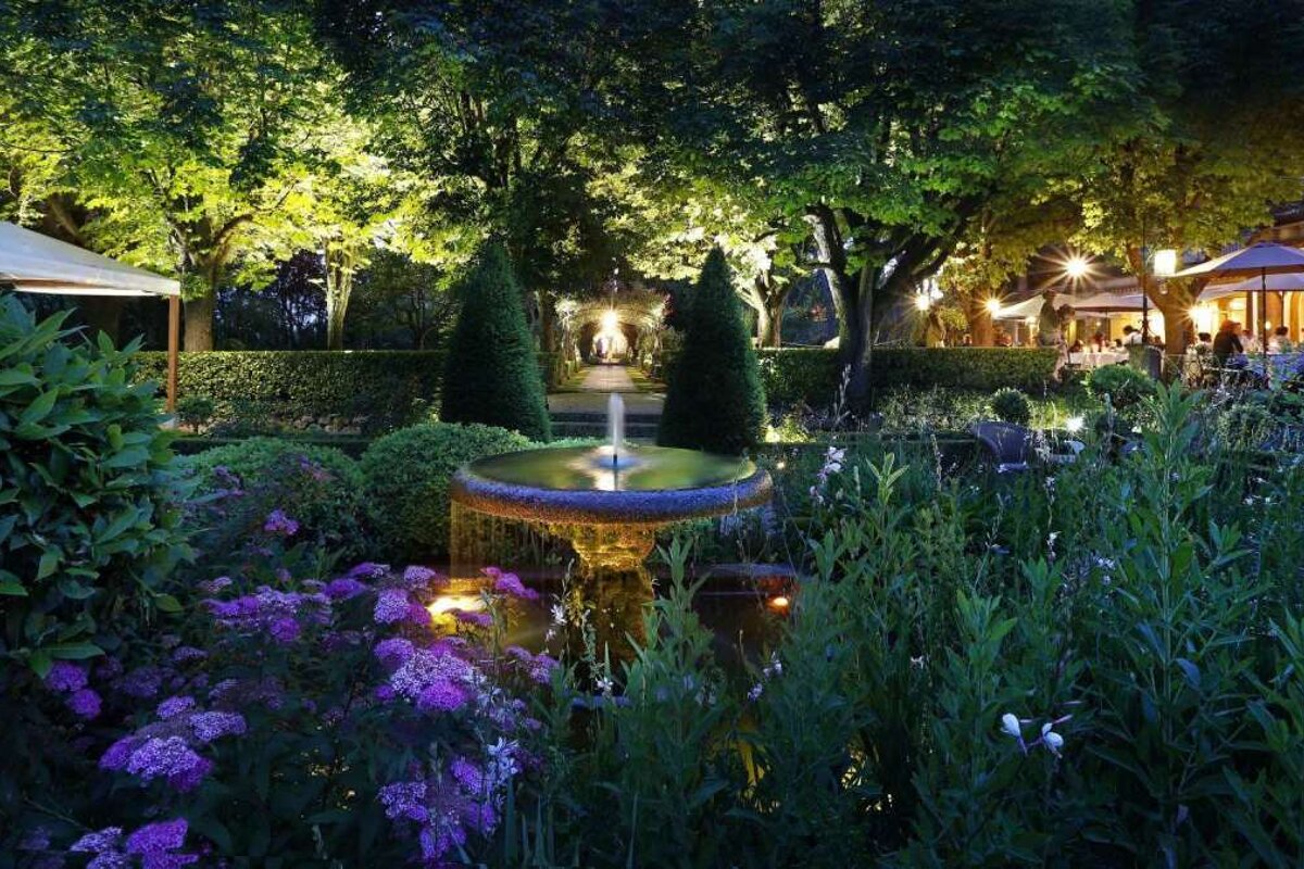 a magical garden at night