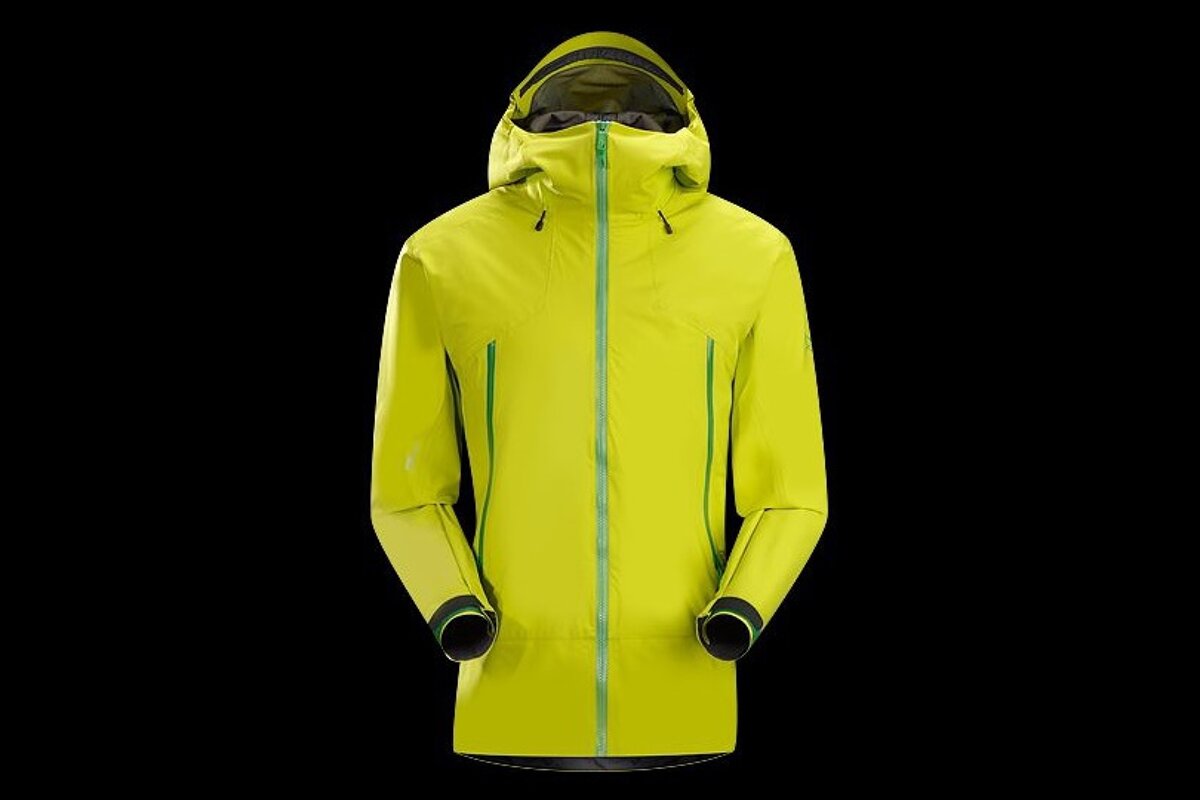 a bright yellow jacket with dark green zips