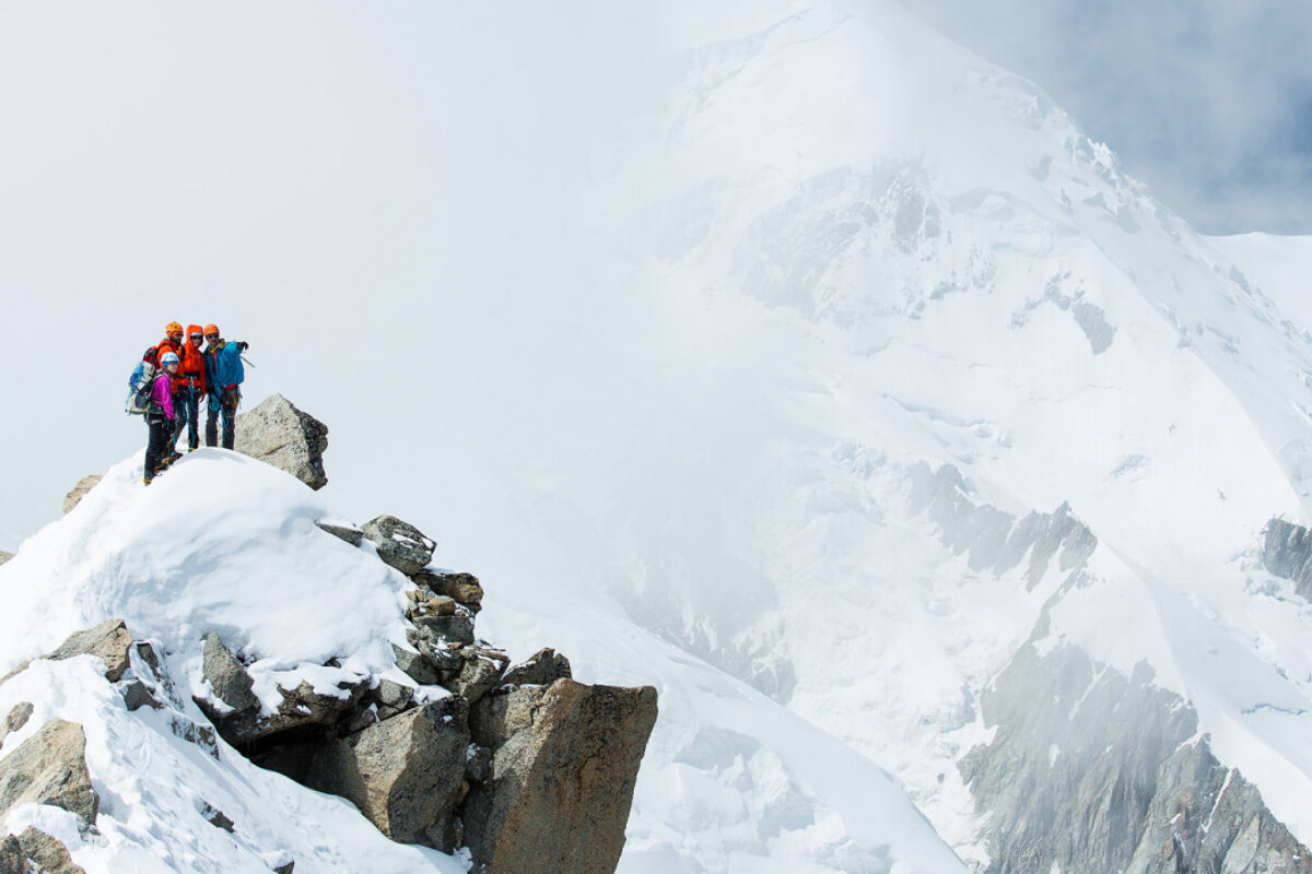 people on top of a mountain in chamonix