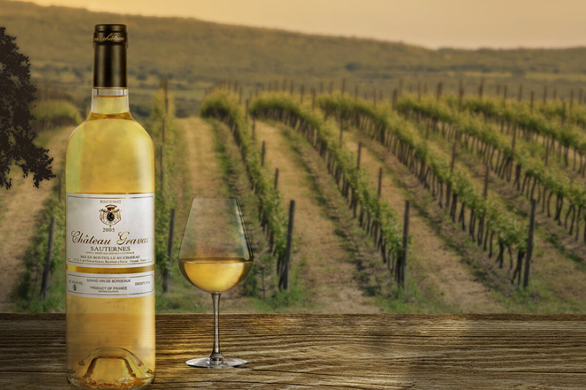 image of a wine bottle and vineyard