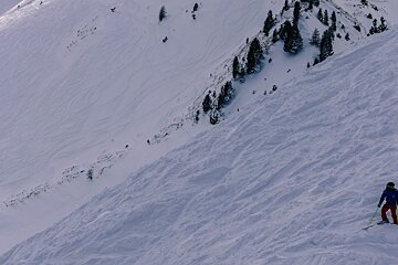 a skier about to go off piste