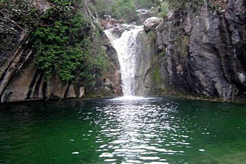 people canyoning on a river