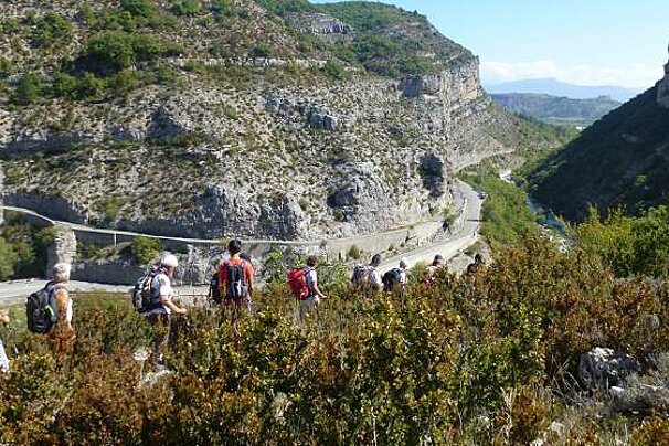 people walking into a canyon in france