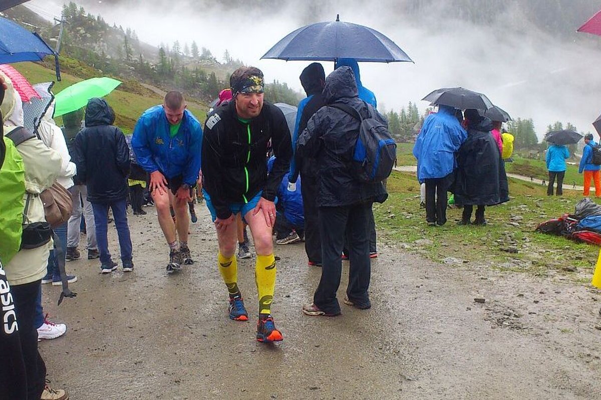 An image of runners in the rain in chamonix mont blanc