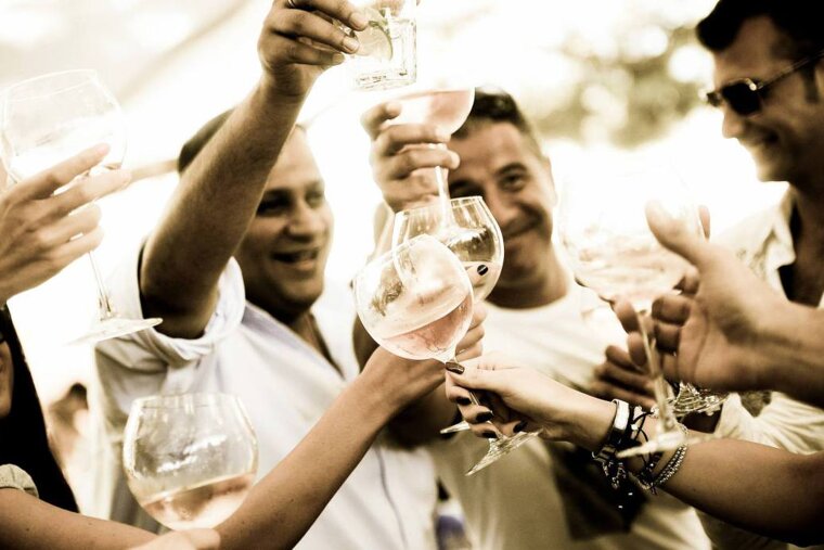 a group of friends drinking in St Tropez
