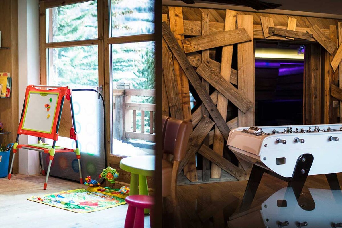 A child 's play area with a table and toys