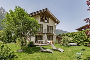 A house with a satellite dish on the roof