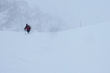 a skier in the fog