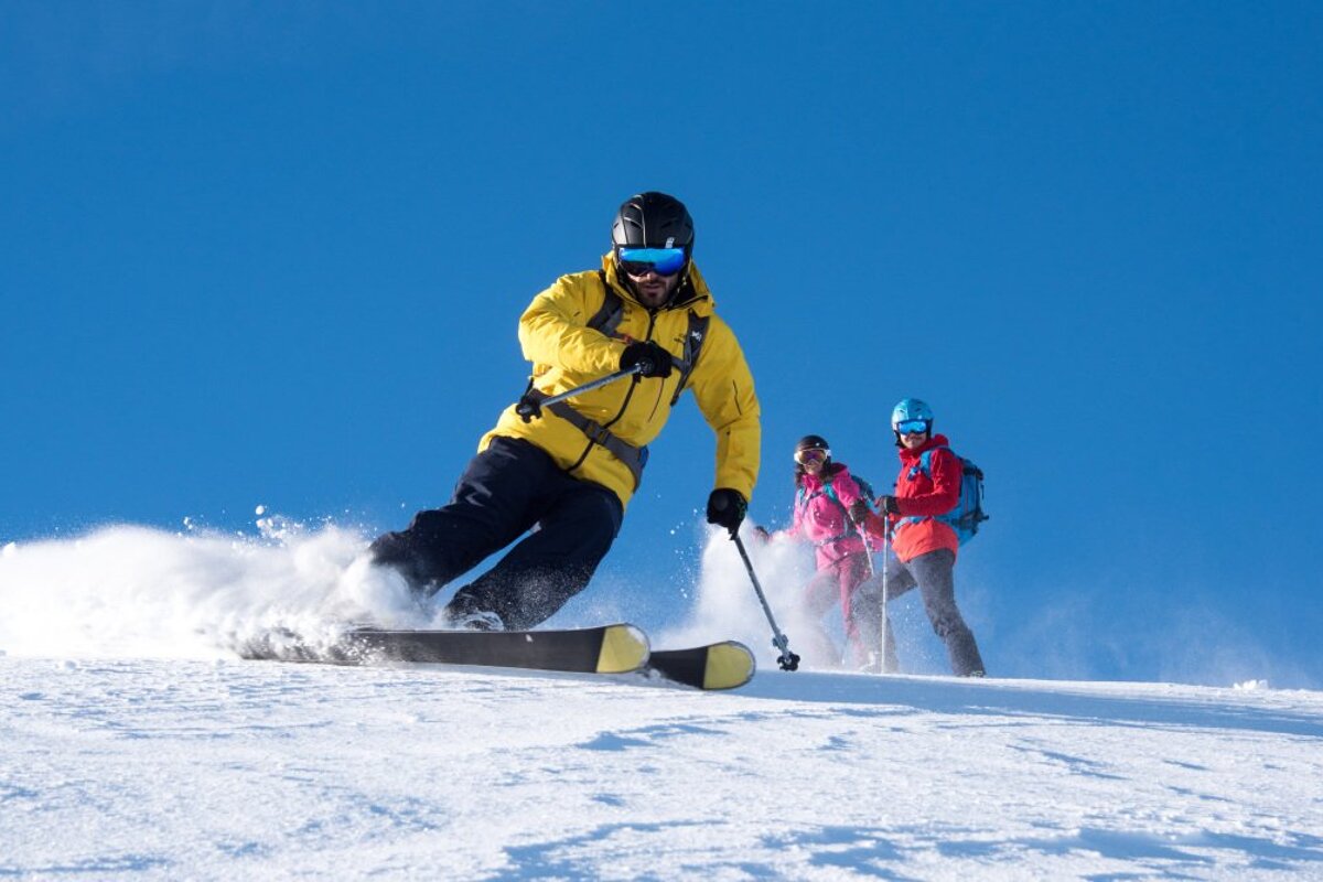 a ski instructor giving a private lesson