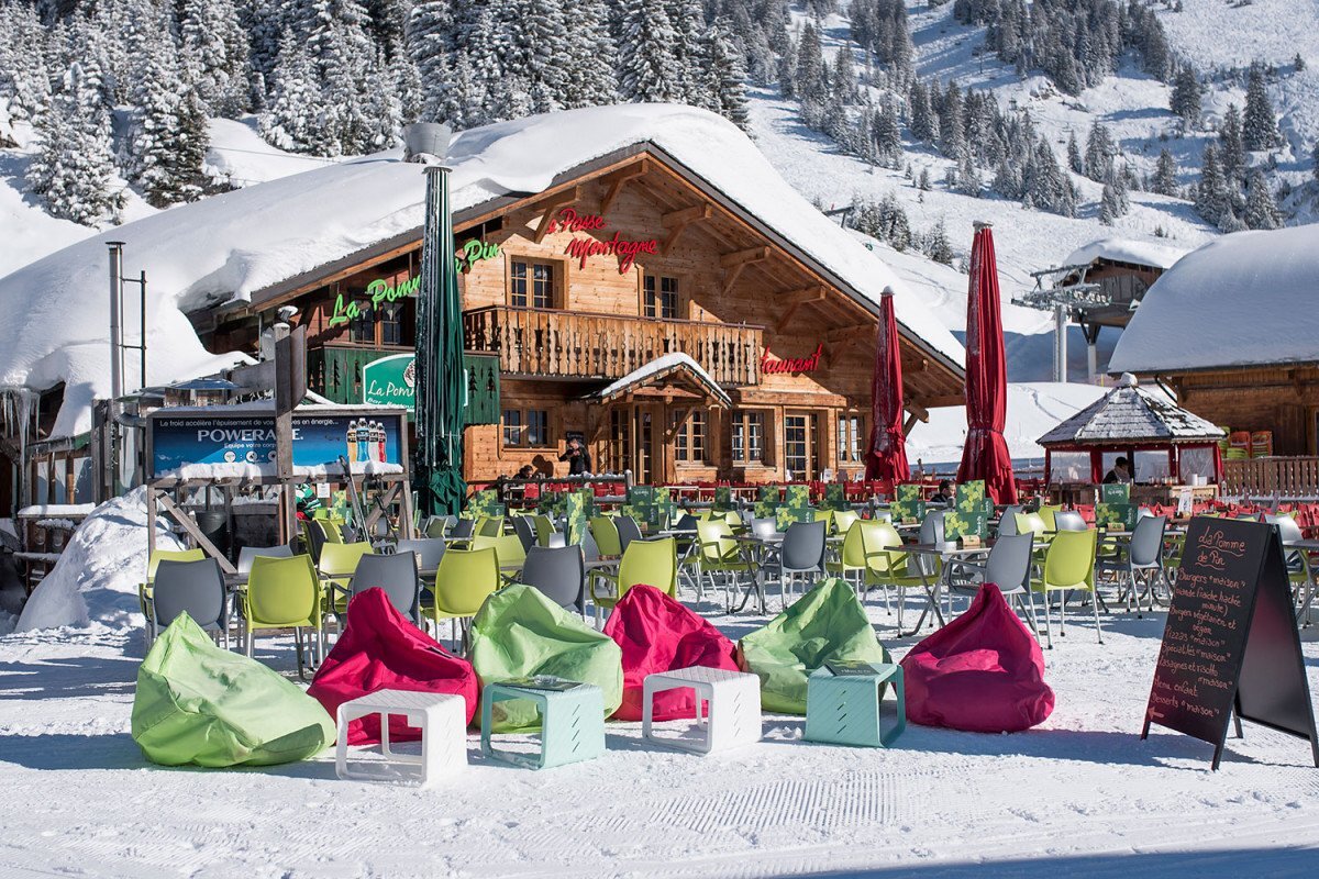 A snowy restaurant with a sign that says powerade