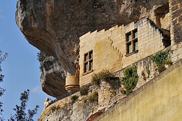 old building in the rocks at les eyzies