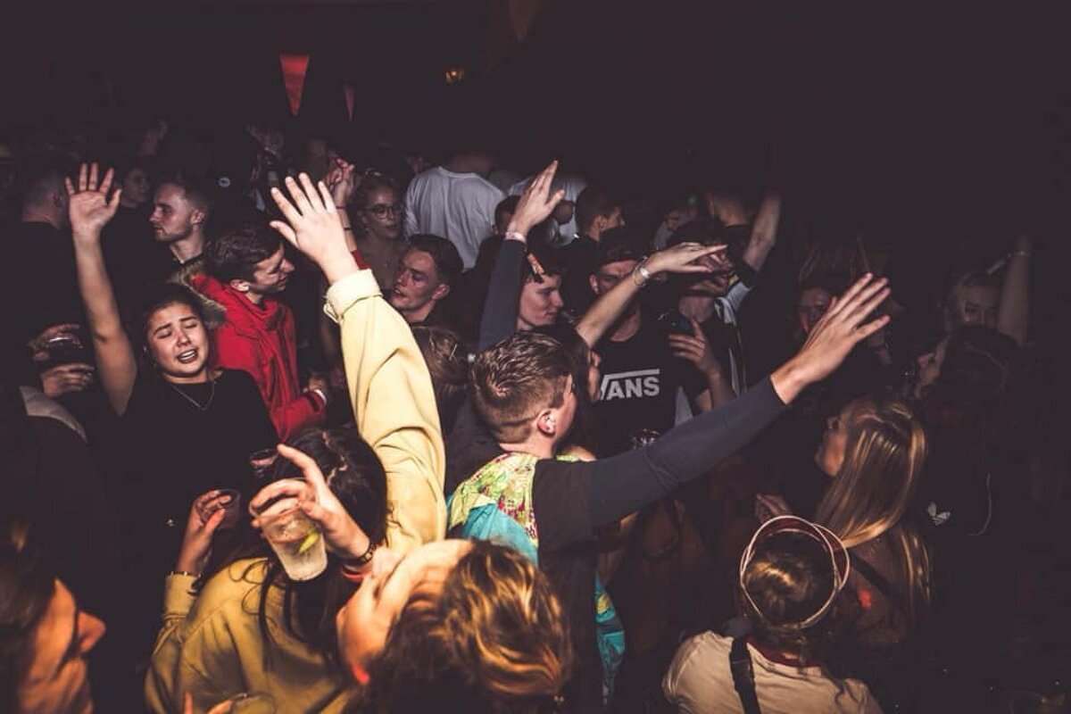 People dancing in the bar
