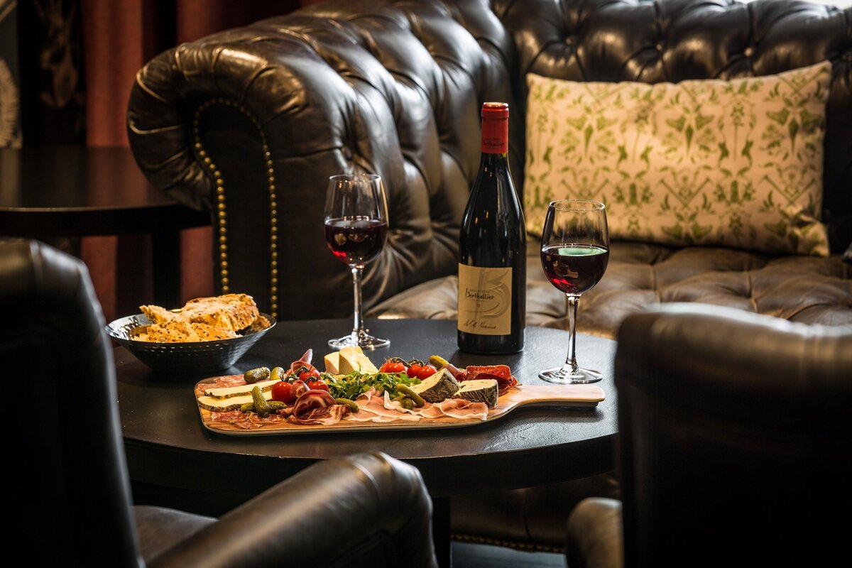 A restaurant with tables and chairs and a menu on the table