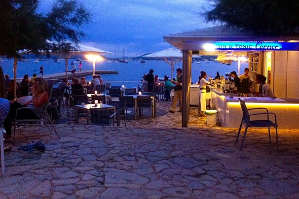 a beach front bar in mallorca at dusk