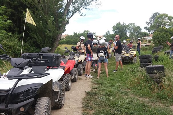 a group of people quad biking