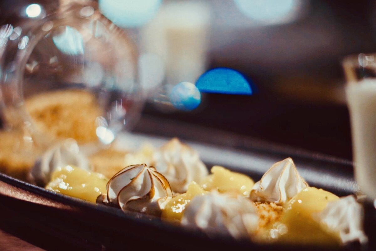 A close up of a dessert with whipped cream on top