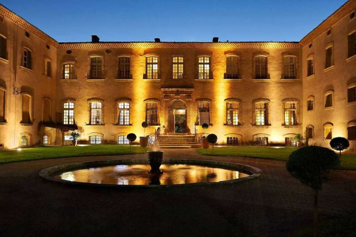 a large stone house hotel