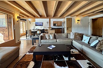 A living room with a couch and a coffee table