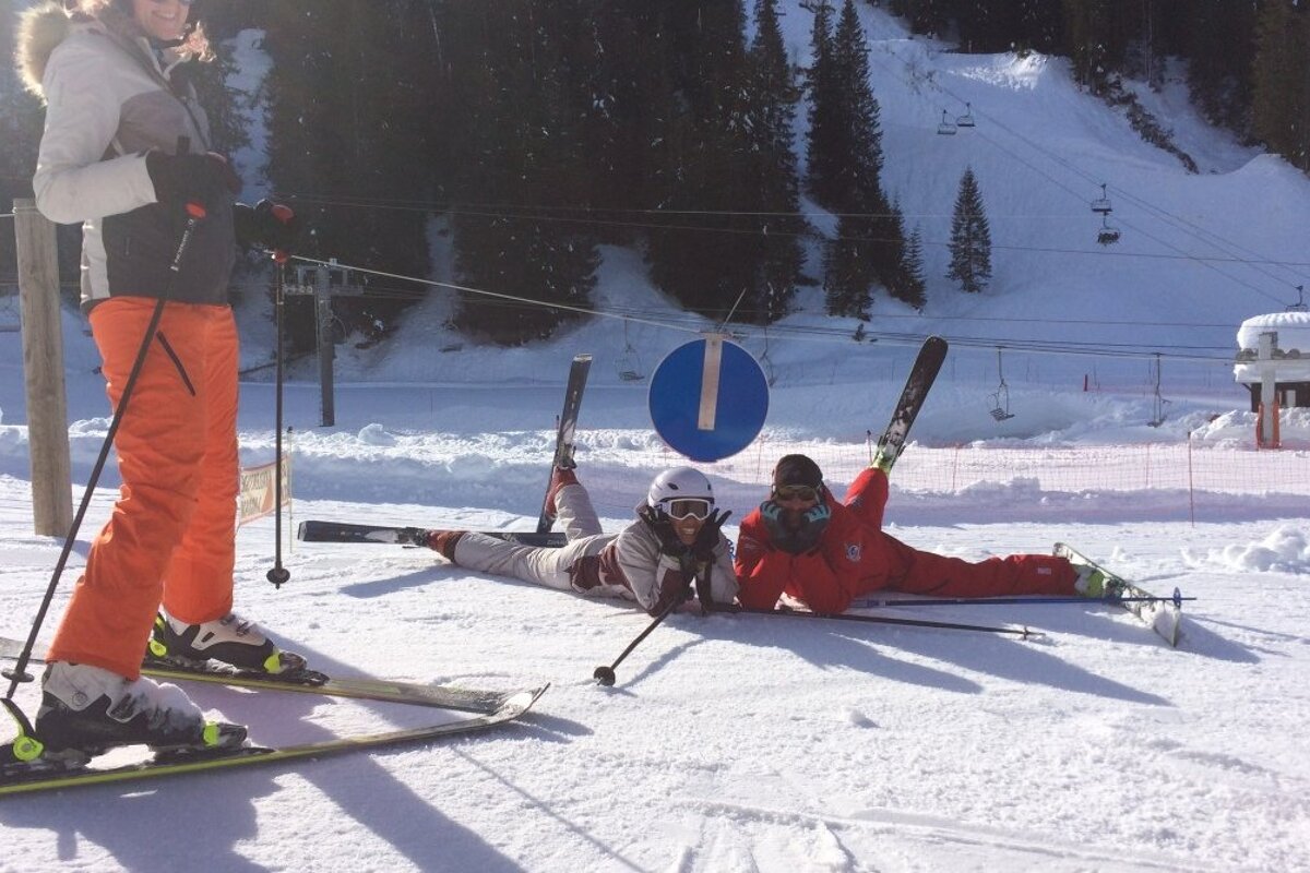 a ski instructor giving a group lesson