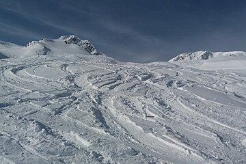 snow off to the sides of the Crozats lift