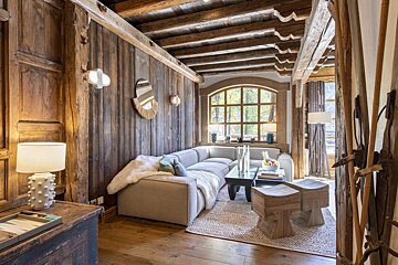A living room with a couch and a table