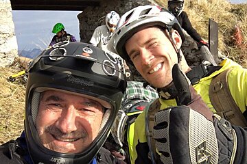 two men in mountain bike helmets
