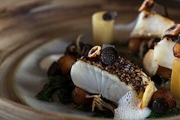 A close up of a plate of food on a table