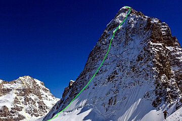 A mountain with a green line going up it